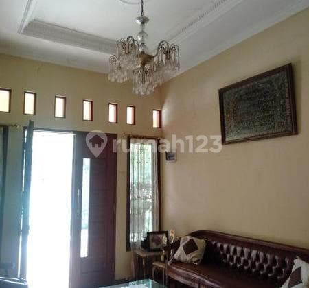 rumah dengan taman luas dicluster premium bebas banjir graha raya