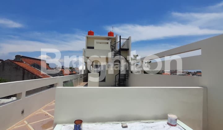 RUMAH DAN RUKO DI TENGAH KOTA