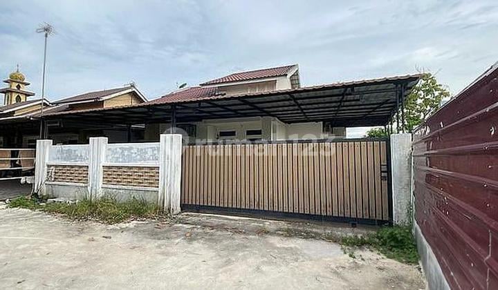 RUMAH JL. PURWODADI EKA TUNGGAL KOMPLEK COKLAT RESIDENCE