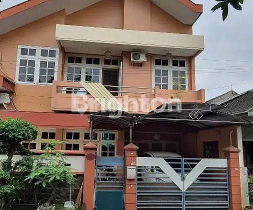 RUMAH DI TAMAN INDAH GAYUNGSARI MENANGGAL