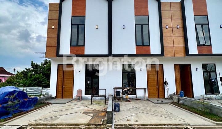 RUMAH TOWNHOUSE BARU CANTIK DI DALAM KOMPLEK PERUMAHAN ONE GATE SYSTEM DI DAERAH KENTEN