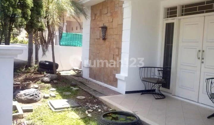 Rumah di Delta Asri, siap huni, terawat, Row Jalan Lebar, tandon dan pompa air, garasi dalam.