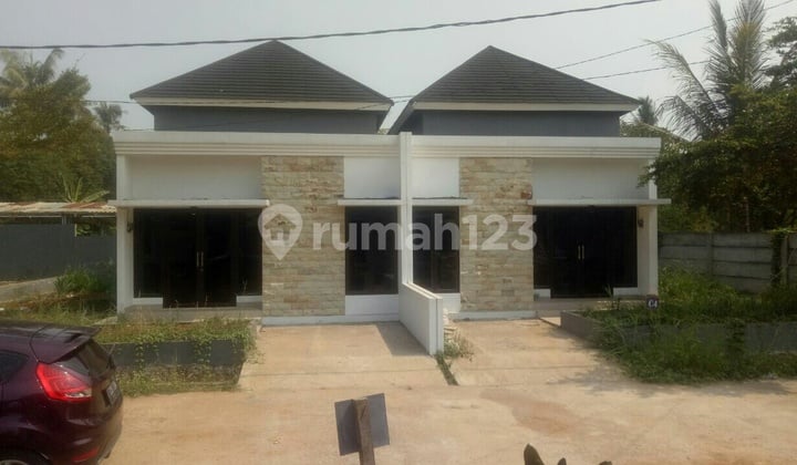 Ready-to-occupy house in Depok, Cimanggis, no down payment, flood-free, near MRT station, toll gate, and busway stop.