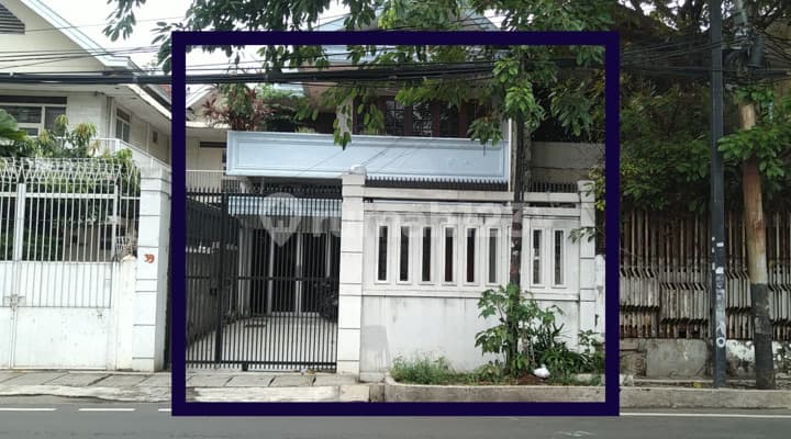 house by the roadside, on Jl. Kartini Raya, Sawah Besar, Central Jakarta.