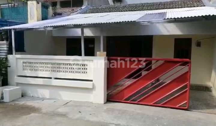 RUMAH MINIMALIS MODERN DI PERUM TAMAN CIBODAS