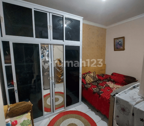 Dijual rumah di perumnas depok Timur dan bonus msin air isi ulang