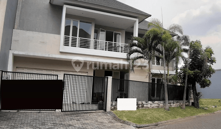 rumah graha famili dekat citraland,royal residence pakuwon indah
