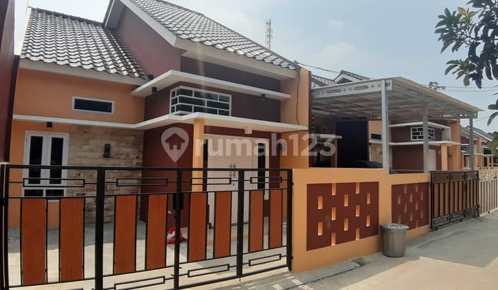 Rumah dekat jalan raya harga terjangkau