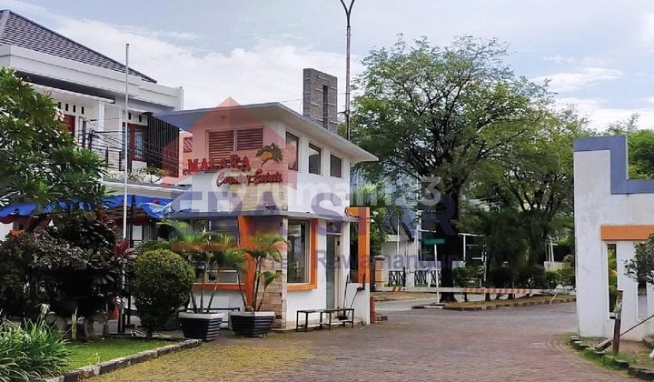 Rumah depan taman, harga sangat miring di Malaka Country Jakarta Timur