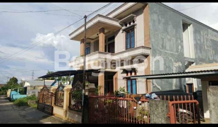 lingkungan asri dan padat penduduk