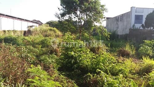 tanah padat mainroad jln soekarno hatta