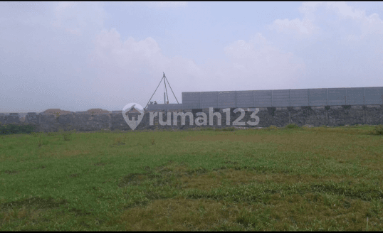 di tanah -+ 22000 M2 di Karawang jln lingkar tanjung pura