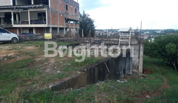 Tanah Jln. soekarno Hatta Km4 pas pinggir jalan,bangunan ruko kokoh pengerjaan 30%