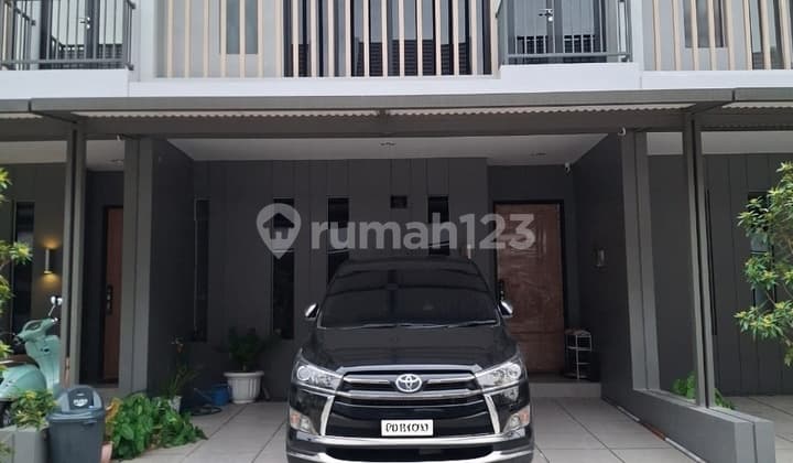 Ready-to-Occupy House in a Security Cluster with One Gate System, Location Close to the Toll Road at Grand Wisata Bekasi