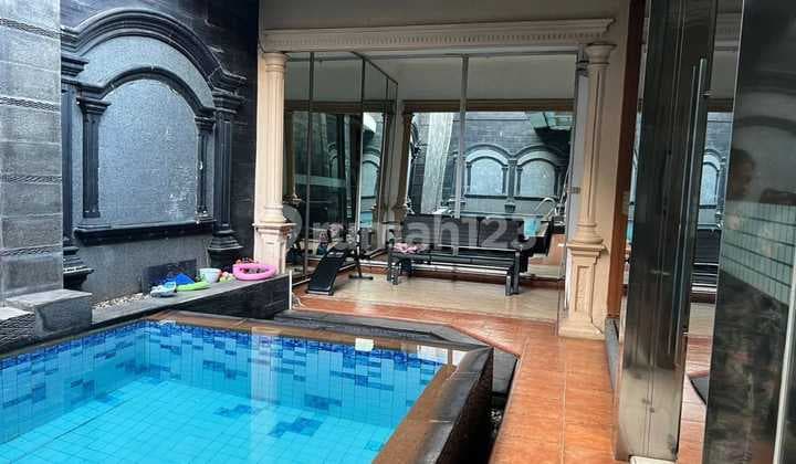 Rumah Siap Huni Ada Swimming PoolnProbadi Lokasi Strategis di PinggirnJalaj Raya Dekat ke Kantor Kecamatan Dekat ke Tol Becakayu di Duren Sawit