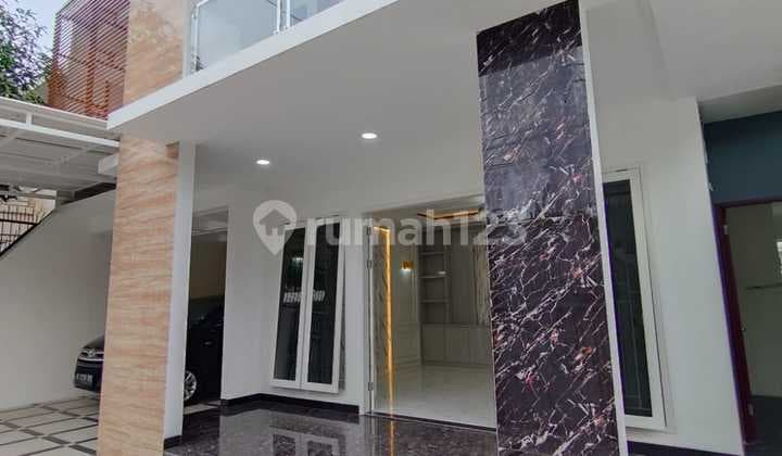 Luxury furnished flood-free house in the Kejaksaan Joglo complex, West Jakarta.
