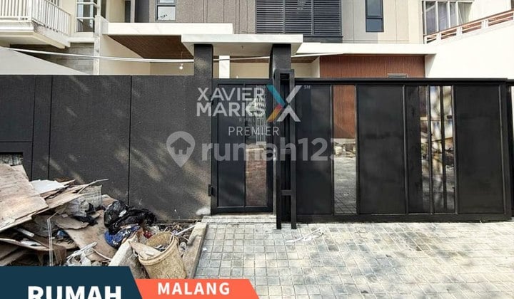 Properti Langka Rumah Modern Tropis di Cluster Golf Araya Malang