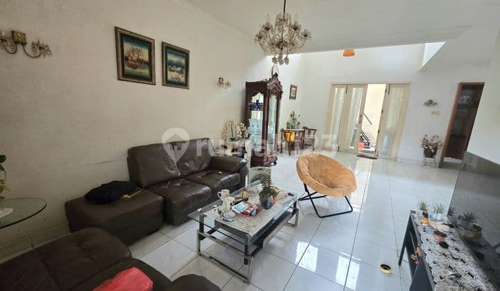 House with a Spacious Yard in a Cluster Near Toll and KRL Access in Bintaro