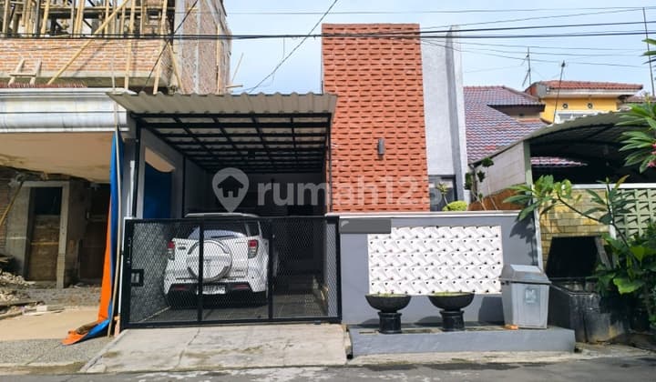 Rumah Tinggal Industrial Minimalis di Villa Galaxy