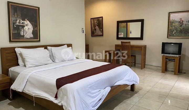 2-storey house with 15 bedrooms with a backdrop of Mount Agung