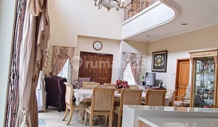 Corner House in Metro Permata Near Green Lake, Land Area 421M2, Good Furnishing