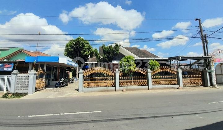 Rumah & Usaha Air Karangklesem Strategis Pinggir Jalan Raya