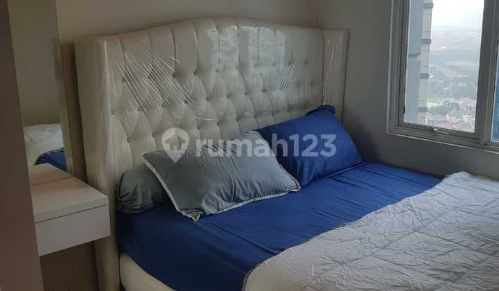 Tanglin Connect Apartments Pakuwon Mall PTC. Near Unesa Lidah Campus.