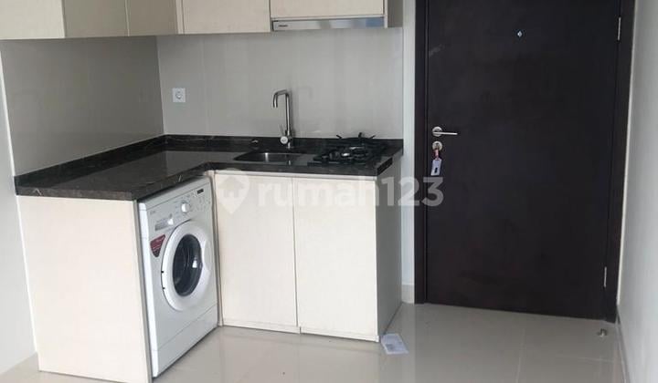 Disewakan apartemen puri mansion Type 2 bedroom private lift semi furnish
