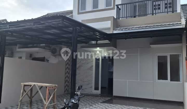 DI JUAL RUMAH BARU BUANA GARDENIA BANGUNAN 2 LANTAI KAMAR TIDUR 3 SIAP HUNI