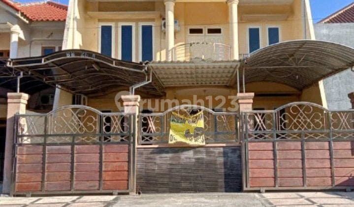 House on Main Street Dharmahusada Mas Surabaya