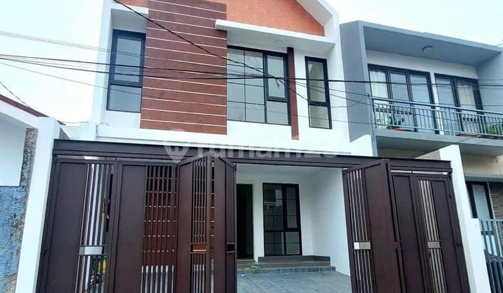 Dijual Rumah Cantik 2,5 Lantai Lokasi Strategis Sunrise Garden