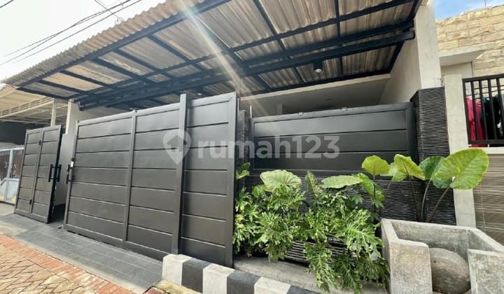 Rumah di Griya Babatan Mukti Wiyung, Surabaya Bagus dan Terawat