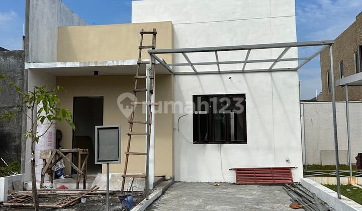 Rumah Dengan Ruang Terbuka Di Tengah Di Sukodono Sidoarjo