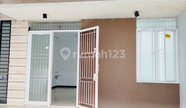 Rumah Minimalis Full Kanopi Di Taman Holis Indah 3 Blok E