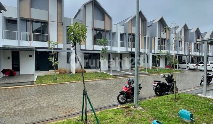 Rumah minimalis modern lebar 7 di Yuthica bsd city