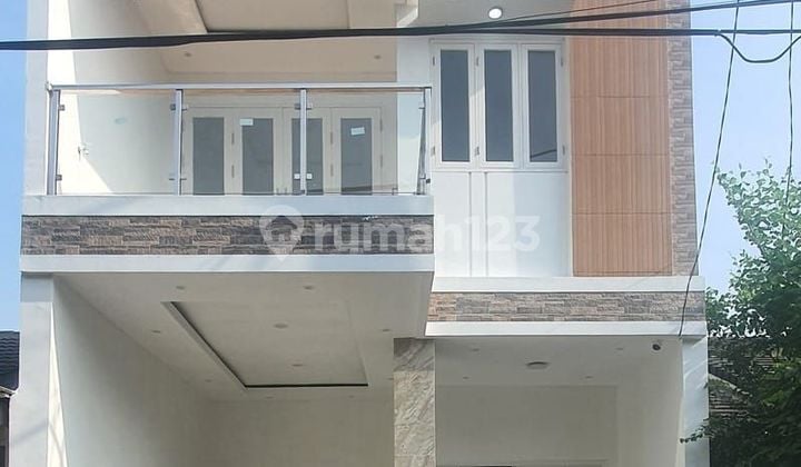 Rumah Modern Minimalis Di Kencana Loka Siap Huni