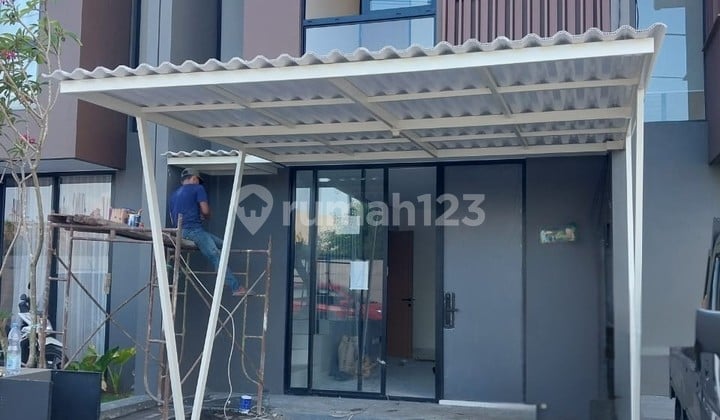 JUAL RUMAH CENTRAL PARK MERR SURABAYA BARU GRESS MODERN