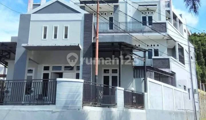 Rumah mewah di perum karisma Ronomuut harga murah