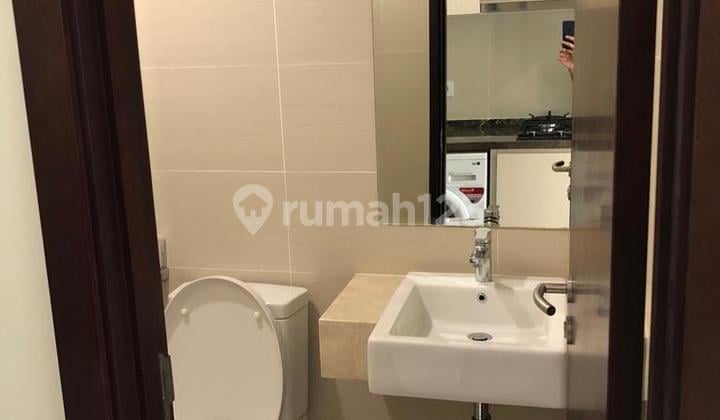 Disewakan Apartemen Type Studio Lantai Rendah Semi-Furnish