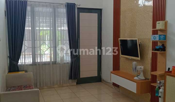 Rumah Minimalis di Cluster One Gate System Graha Raya Bintaro
