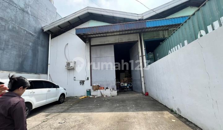 TRANSLATION: For Sale Warehouse with Office Container Access No Flooding Cheapest Price in Kosambi Permai