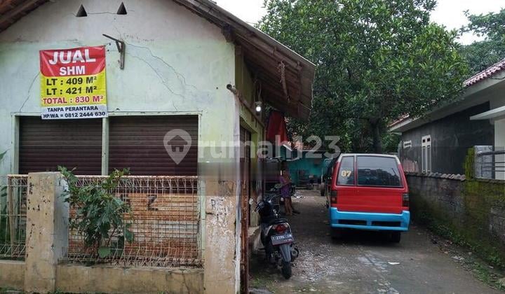 Tanah Lengkap Dengan Bangunannya