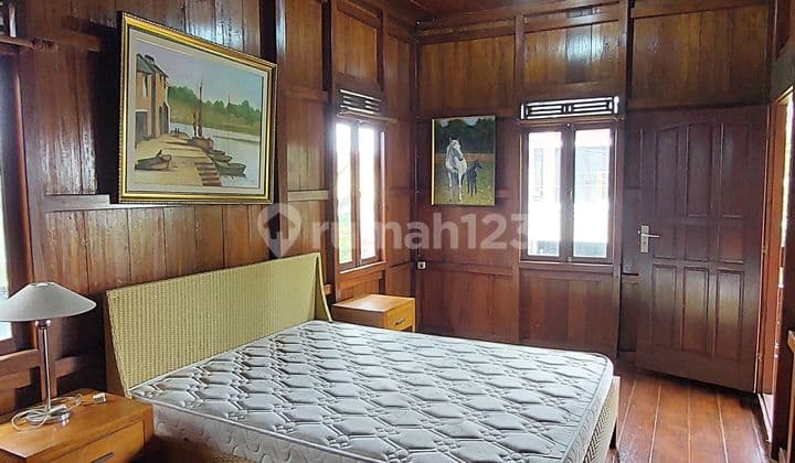 Refreshing and Lush Wood-Concept House in the Pondok Hijau Area of Bandung