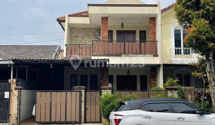 Rumah Modern Minimalis Row Jalan Besar Dalam Cluster Nusa Loka