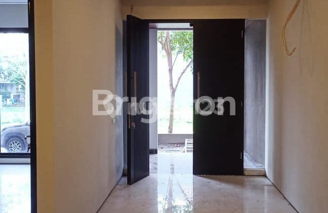 NEW HOUSE WOODLAND CITRALAND WEST SURABAYA WIDTH 9 FAVORITE FRONTAGE