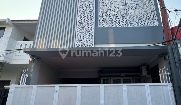 Rumah 2 Lantai SHM Siap Huni + Rooftop @Graha Bunga