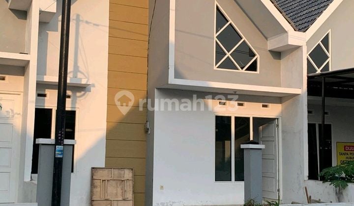 Rumah Cluster Padat Penduduk