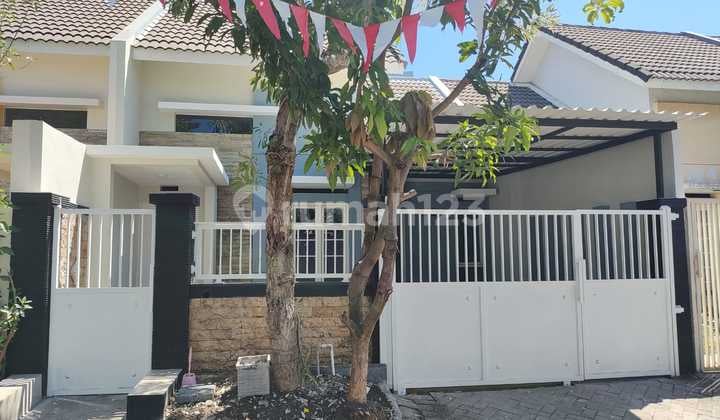 Rumah siap huni baru di renovasi + perabotan di Perum PURI SURYA JAYA CLUSTER VALENCIA GEDANGAN SIDOARJO