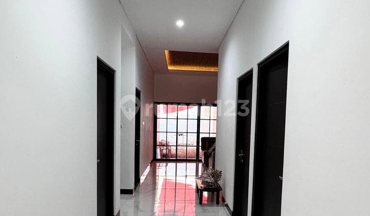 Quick Sale!! Nice House with Large Land Can Be Developed into a Boarding House in Rungkut, Medokan Sawah.