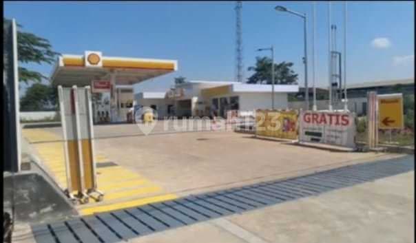 For Sale: Land + Ex-Gas Station Building in Cikarang Street Area.